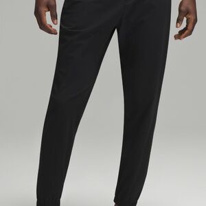 Lululemon Black Surge Jogger Men’s Size Small Hole